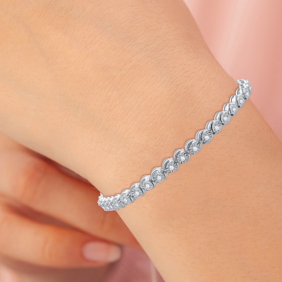 1 CT. T.W. Genuine White Diamond 7.5 Inch Tennis Bracelet in Sterling Silver or 14K Gold Over Silver