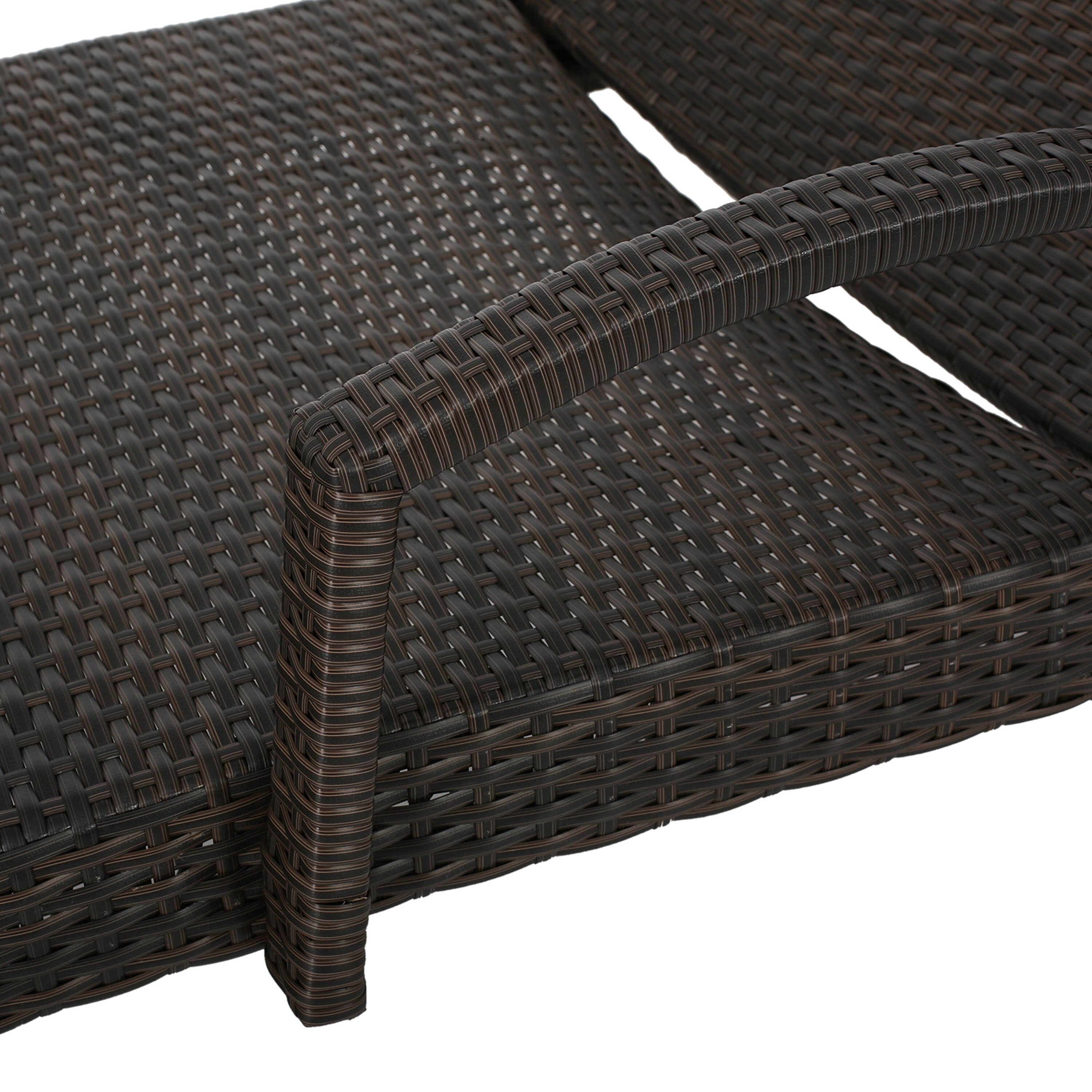 Detail shot showing the woven texture and structural details of the chair.
