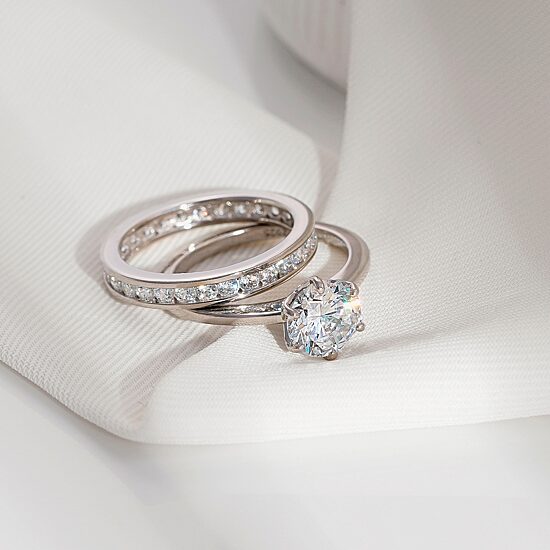 Diamonart Womens Cubic Zirconia Sterling Silver Round Side Stone Bridal Set