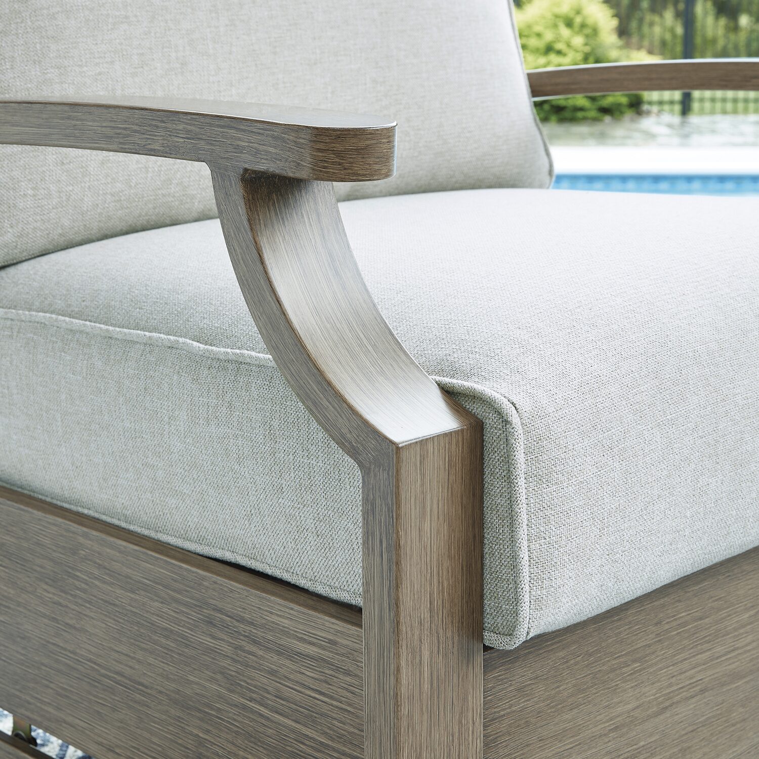 Signature Design by Ashley Raleigh Ranch Outdoor Swivel Glider Chair with Cushion