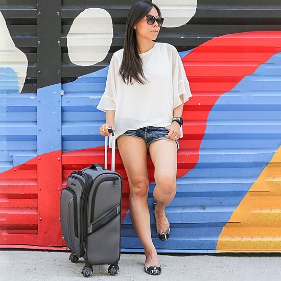 American Tourister Piroutte Deluxe Softside Expandable Checked Spinner Luggage