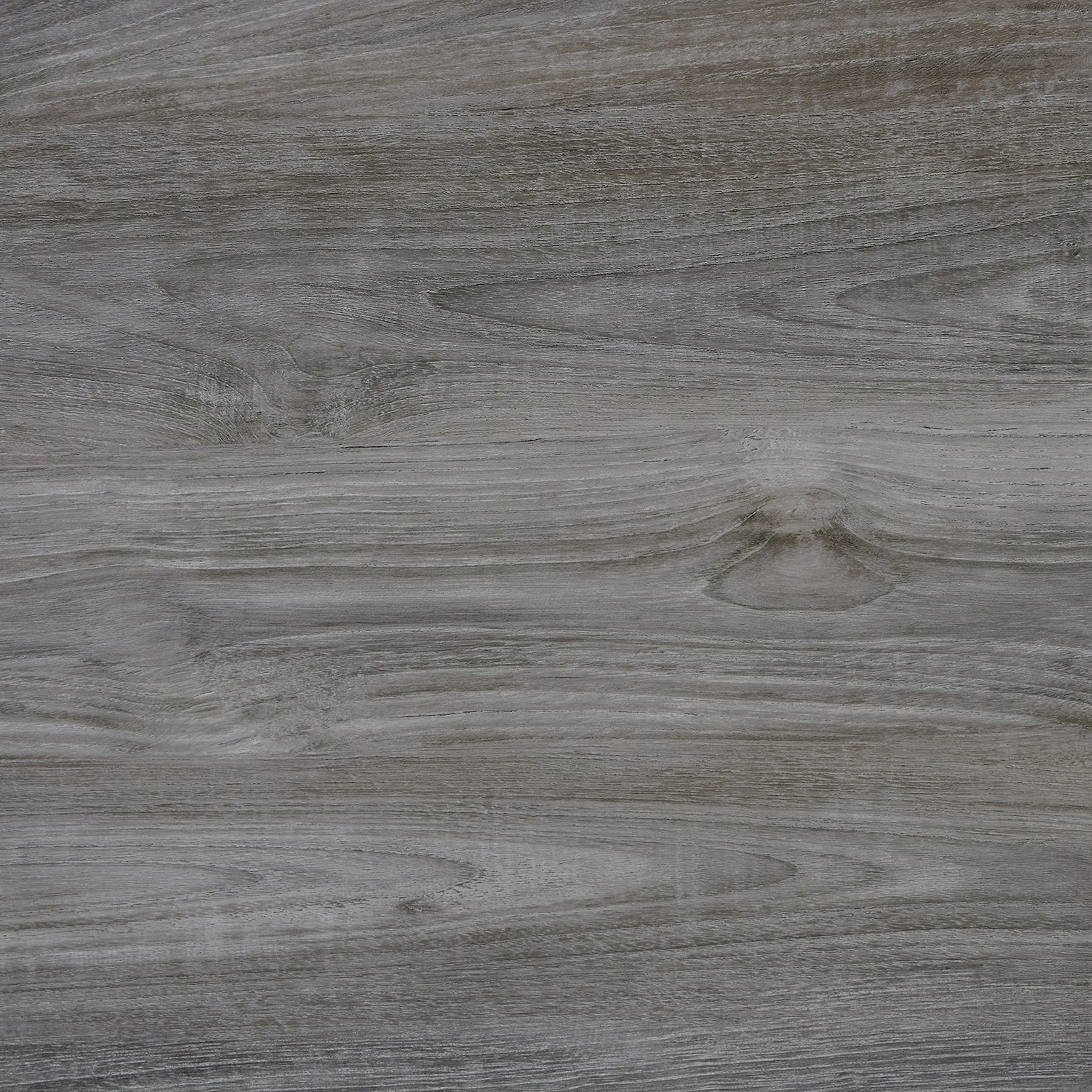 Close-up of the distressed wood grain texture on the bed frame.