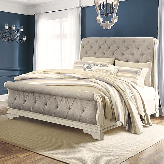Signature Design by Ashley Realyn Upholstered Sleigh Bed in Chipped White