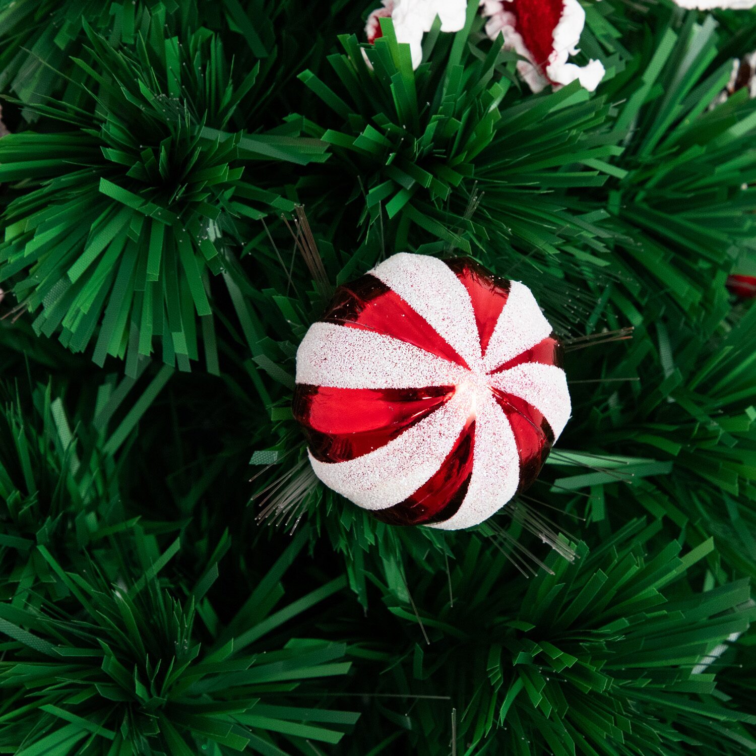 Nearly Natural Pre-Lit Fiber Optic Ornaments Poinsettia And Star Topper 2 Foot Pre-Lit Potted Fir Christmas Tree
