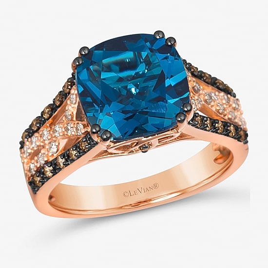 Le Vian® Ring featuring 4 1/2 CT. Deep Sea Blue Topaz™ 1/6 CT. Chocolate Diamonds® 1/6 CT. Nude Diamonds™ set in 14K Strawberry Gold®