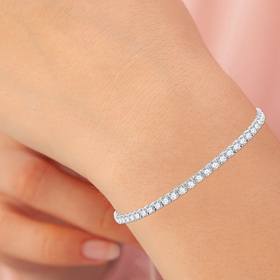 (G / Si1-Si2) 5 CT. T.W. Lab Grown White Diamond 10K White or Yellow Gold 7.5 Inch Tennis Bracelet