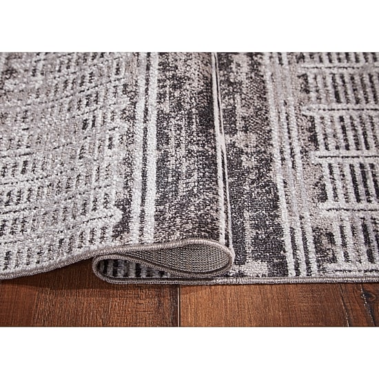 Signature Design by Ashley® Henchester Washable Indoor Rectangular Area Rug
