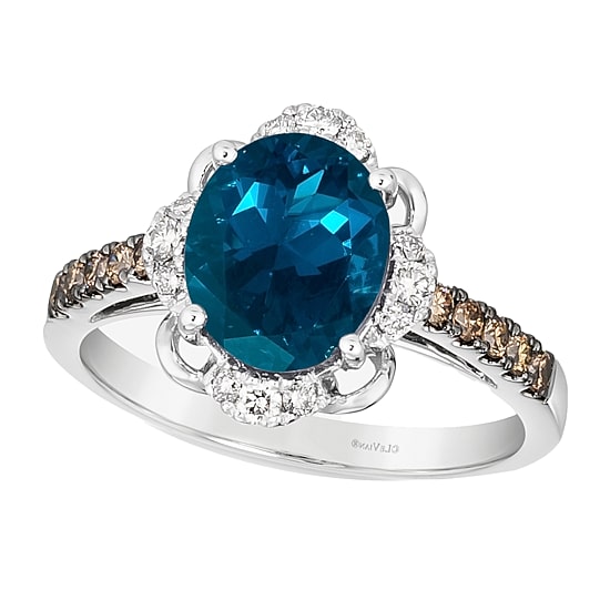 Le Vian® Grand Sample Sale™ Ring featuring 3 CT. Deep Sea Blue Topaz™ 1/5 CT. Nude Diamonds™ 1/5 CT. Chocolate Diamonds® set in 14K Vanilla Gold®