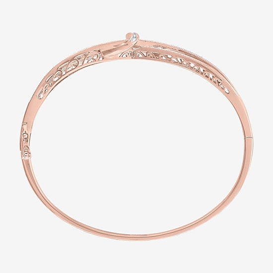 1/10 CT. T.W. Diamond Crossover Bangle Bracelet in Sterling Silver or 14K Gold Over Silver