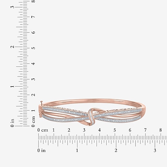 1/10 CT. T.W. Diamond Crossover Bangle Bracelet in Sterling Silver or 14K Gold Over Silver