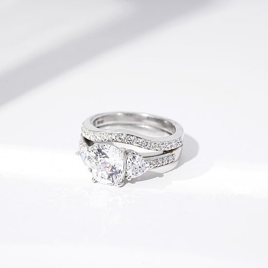 Diamonart Womens Cubic Zirconia Sterling Silver Side Stone 3-Stone Bridal Set