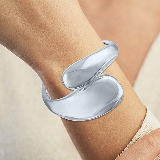 Bold Addiction Womens Pure Silver Over Brass Bangle Bracelet