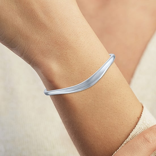 Bold Addiction Womens Pure Silver Over Brass Bangle Bracelet