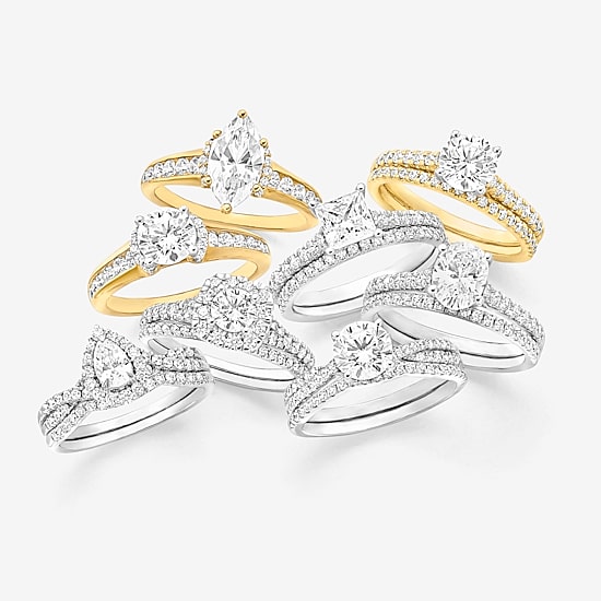 (F / Vs2) Womens 1 1/2 CT. T.W. Lab Grown White Diamond 10K Gold Round Side Stone Engagement Ring