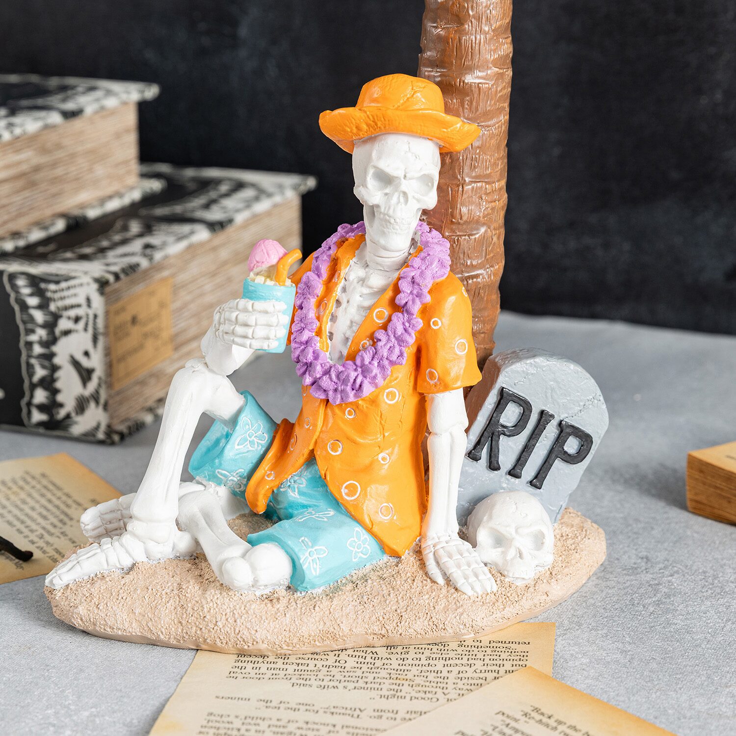 Glitzhome 12" Polyresin Skeleton On Beach Halloween Tabletop Decor