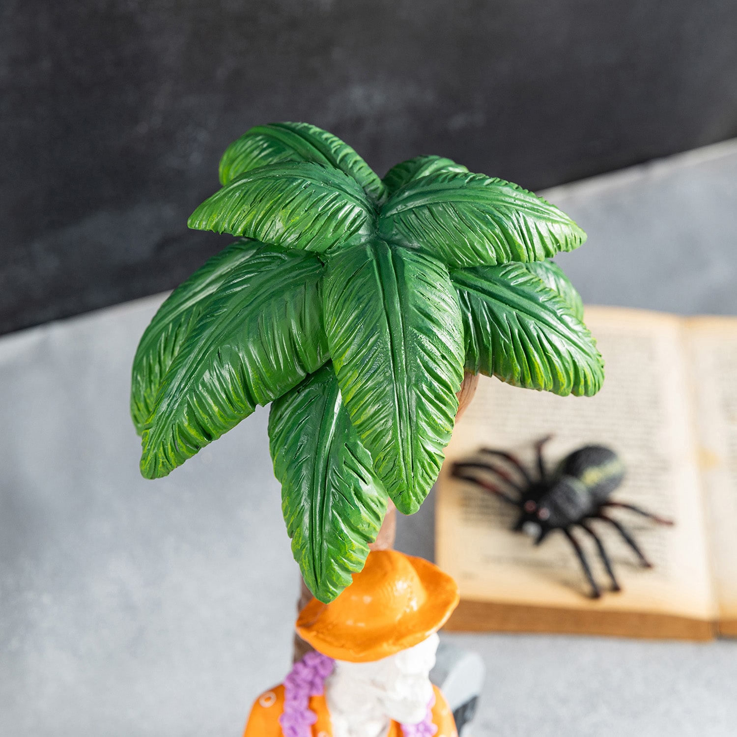 Glitzhome 12" Polyresin Skeleton On Beach Halloween Tabletop Decor