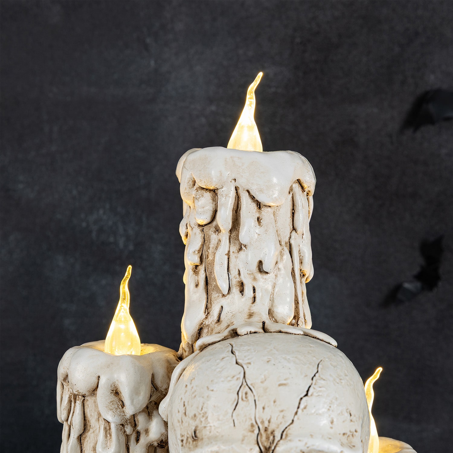 Glitzhome 15" Resin Skulls With Candles Halloween Tabletop Decor