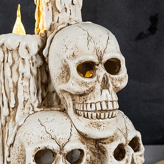 Glitzhome 15" Resin Skulls With Candles Tabletop Decor