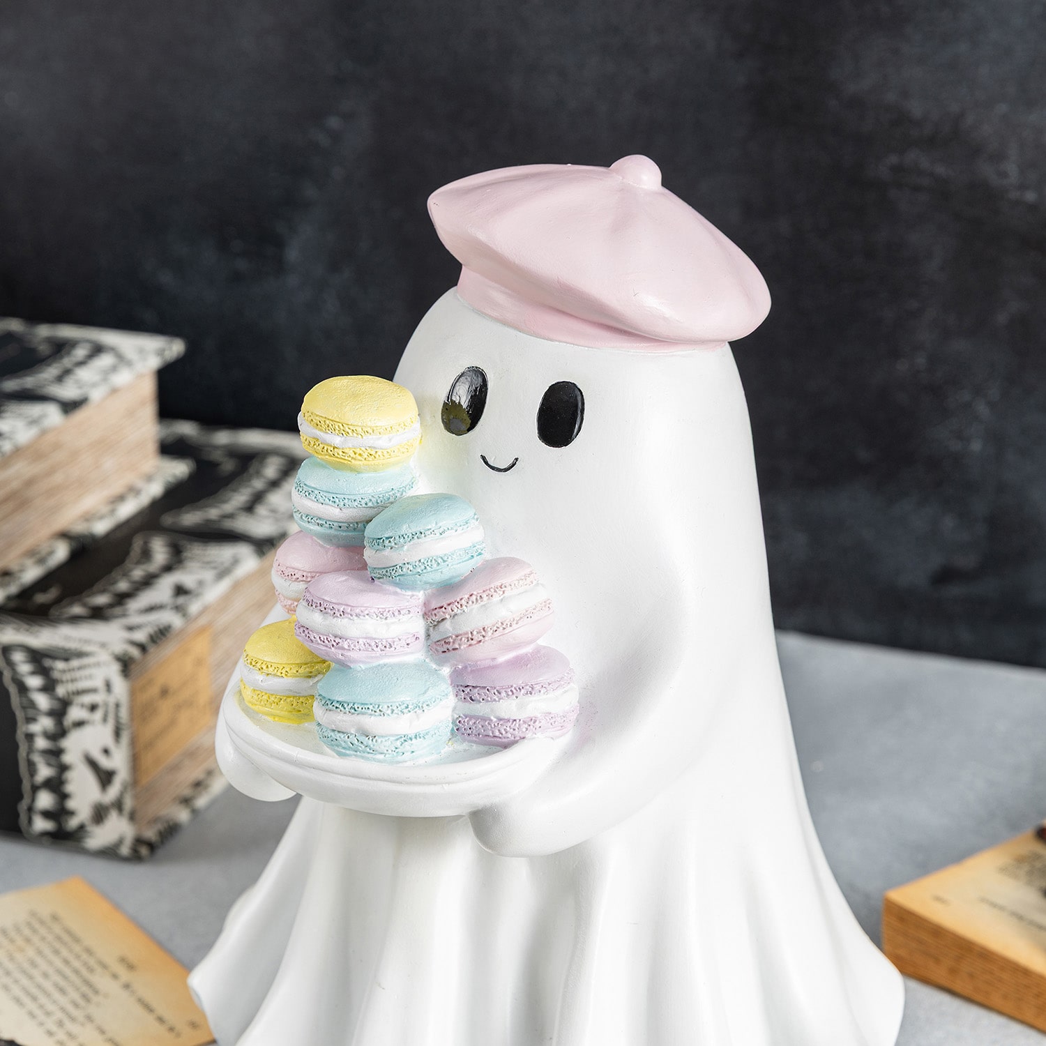 Glitzhome 10"Polyresin Ghost With Macarons Halloween Tabletop Decor