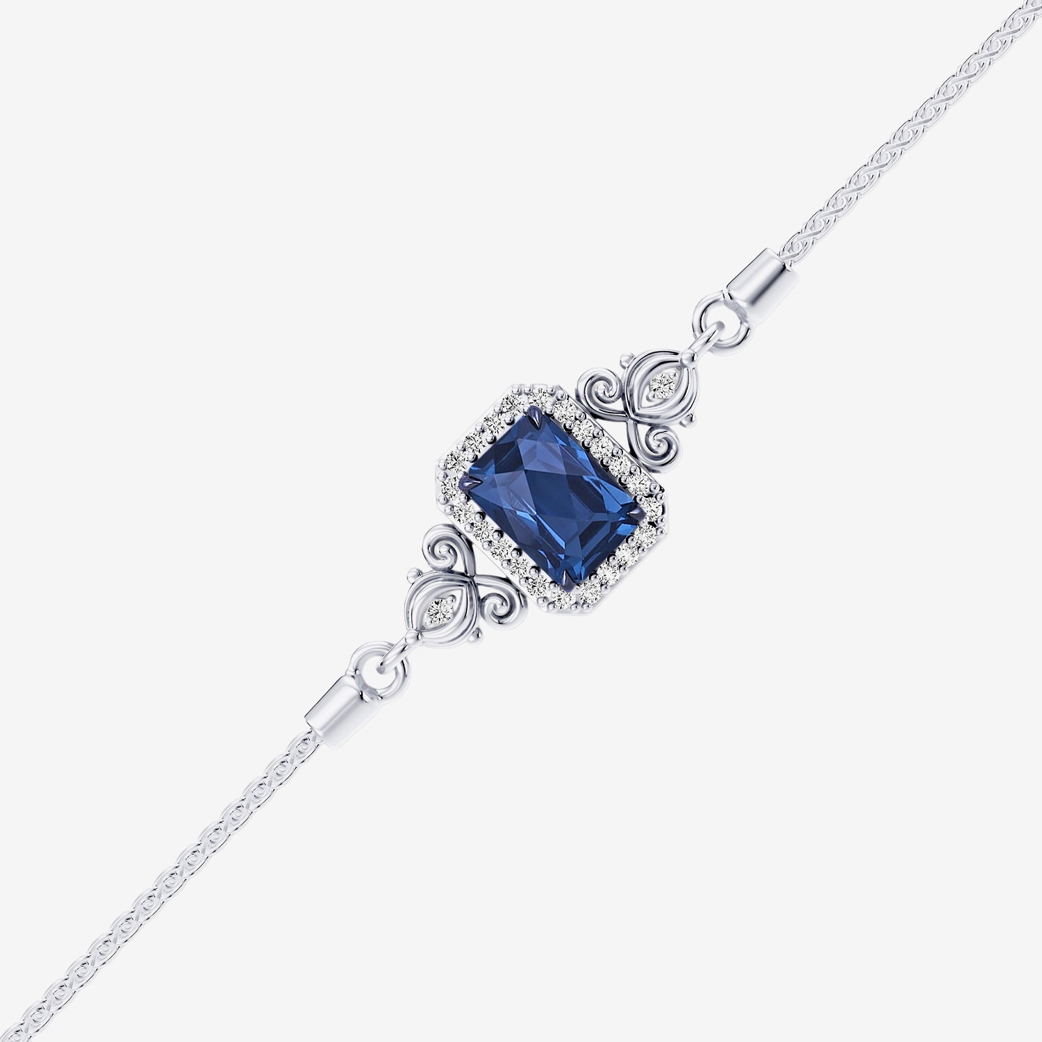 Enchanted Disney Fine Jewelry Cinderella (I / I2) Womens 1/8 CT. T.W. Genuine Blue Topaz Sterling Silver Cinderella Bolo Bracelet