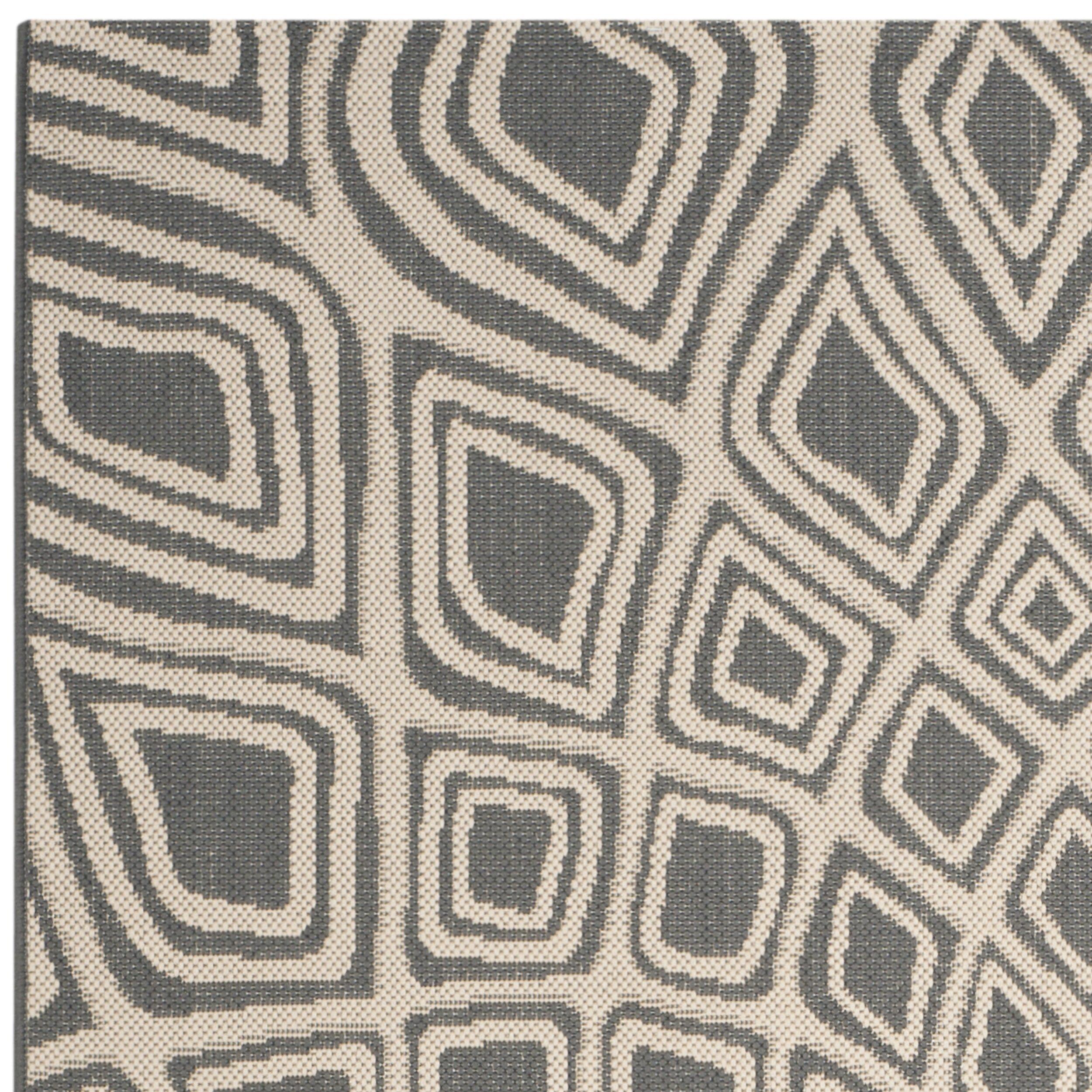 Safavieh Courtyard Collection Jacinth Geometric Indoor/Outdoor Round Area Rug